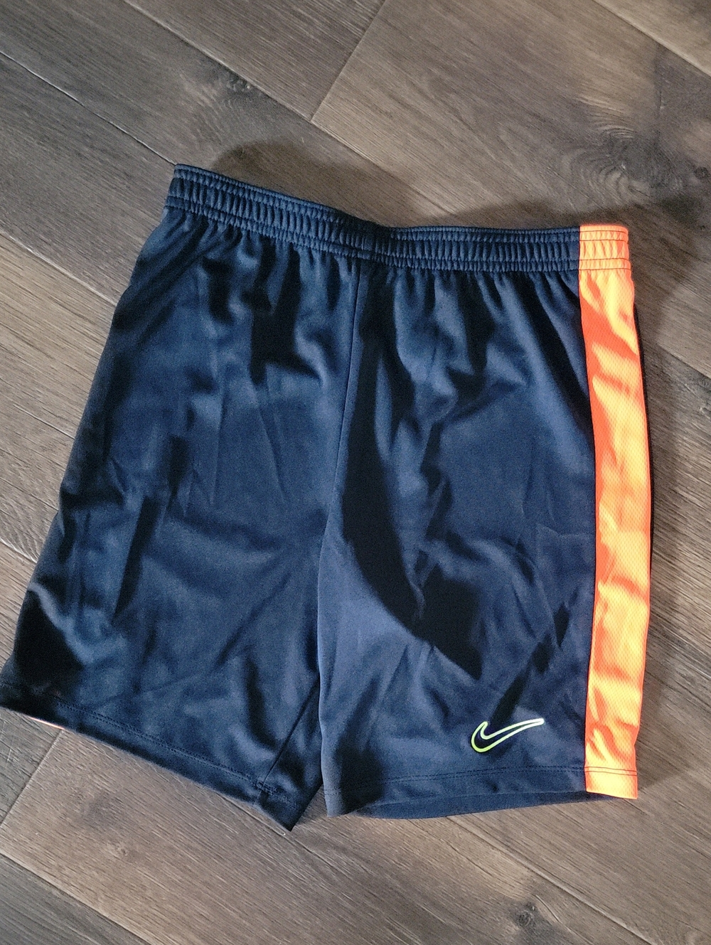 Nike Boy’s Dri-Fit Navy Athletic Shorts with Orange Side Stripe